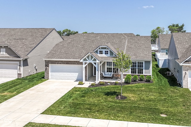 9846 Zion Way, Pendleton, IN 46064 - view of front of house featuring a garage, concrete driveway, a front yard, and covered porch