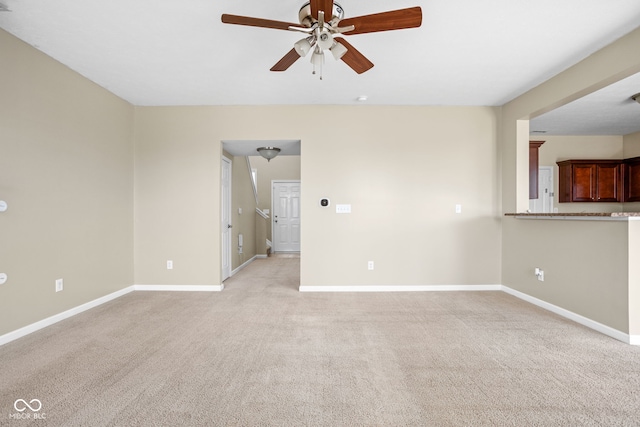3827 Dusty Sands Rd, Whitestown, IN 46075 - unfurnished living room with ceiling fan and light carpet