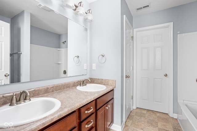3827 Dusty Sands Rd, Whitestown, IN 46075 - full bathroom featuring double vanity, stone finish floors, and shower / washtub combination