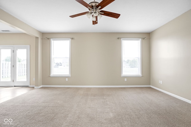 3827 Dusty Sands Rd, Whitestown, IN 46075 - carpeted spare room with a ceiling fan and baseboards