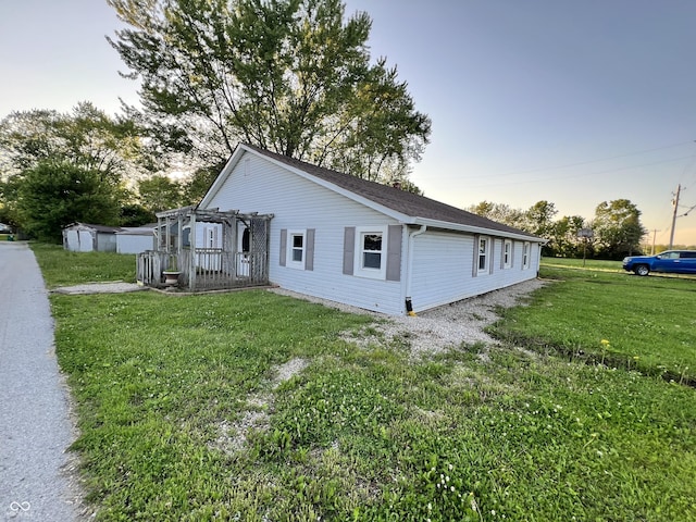 3074 N 625 E, Franklin, IN 46131 - view of home's exterior with a pergola, a yard, a shed, and a shingled roof