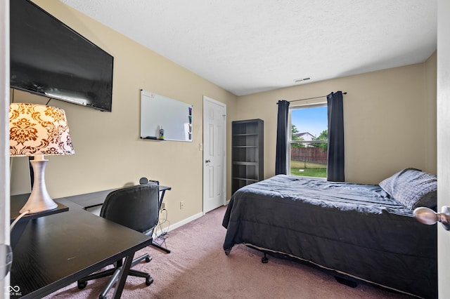 49 Grassy Dr, Whiteland, IN 46184 - bedroom featuring carpet floors, a textured ceiling, and a desk