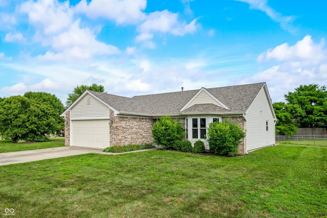 49 Grassy Dr, Whiteland, IN 46184 - view of front of house with concrete driveway, brick siding, a garage, and roof with shingles
