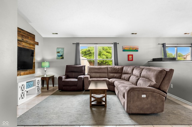 49 Grassy Dr, Whiteland, IN 46184 - living room with tile patterned flooring and healthy amount of natural light