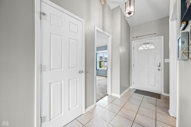49 Grassy Dr, Whiteland, IN 46184 - entryway with light tile patterned floors and light carpet