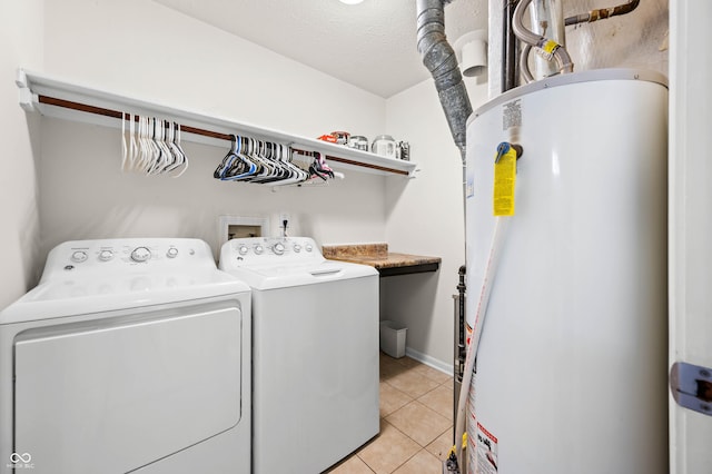 49 Grassy Dr, Whiteland, IN 46184 - laundry room with gas water heater, independent washer and dryer, and light tile patterned flooring