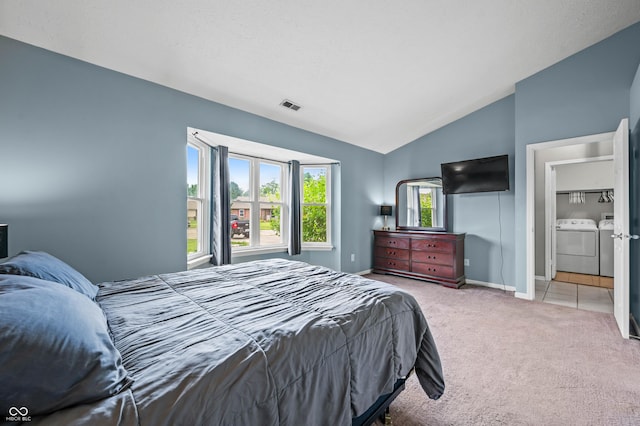 49 Grassy Dr, Whiteland, IN 46184 - bedroom with separate washer and dryer, vaulted ceiling, and carpet floors