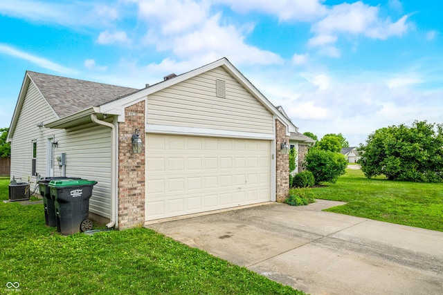49 Grassy Dr, Whiteland, IN 46184 - view of property exterior with driveway, a shingled roof, a lawn, a garage, and brick siding