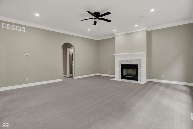 7131 Nile Ridge Ct, Indianapolis, IN 46236 - unfurnished living room featuring arched walkways, ceiling fan, crown molding, recessed lighting, and carpet floors