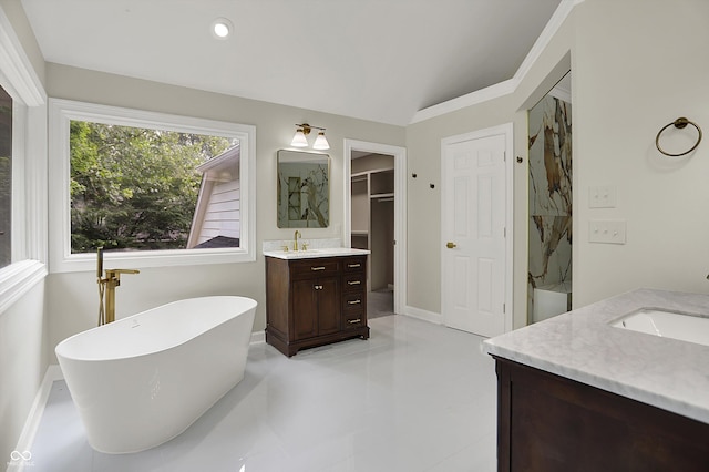 7131 Nile Ridge Ct, Indianapolis, IN 46236 - full bath with vanity, a soaking tub, a marble finish shower, a spacious closet, and tile patterned flooring
