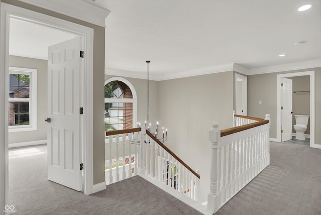 7131 Nile Ridge Ct, Indianapolis, IN 46236 - corridor featuring an upstairs landing, carpet flooring, a chandelier, and recessed lighting