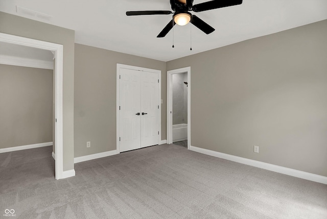 7131 Nile Ridge Ct, Indianapolis, IN 46236 - unfurnished bedroom with carpet flooring, a closet, and a ceiling fan