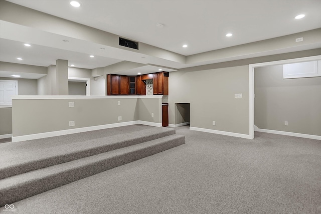7131 Nile Ridge Ct, Indianapolis, IN 46236 - unfurnished living room featuring light colored carpet and recessed lighting