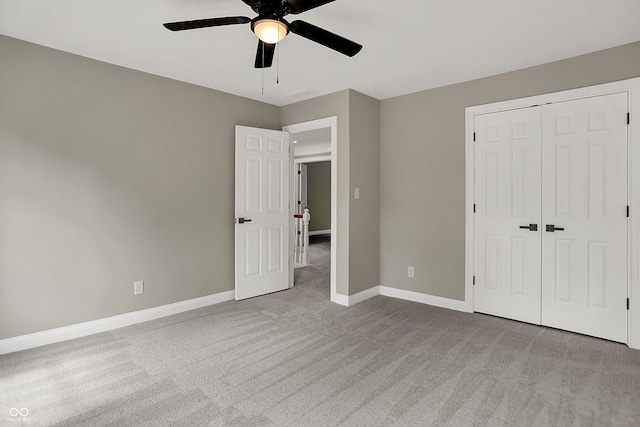 7131 Nile Ridge Ct, Indianapolis, IN 46236 - unfurnished bedroom with carpet floors, a closet, and a ceiling fan
