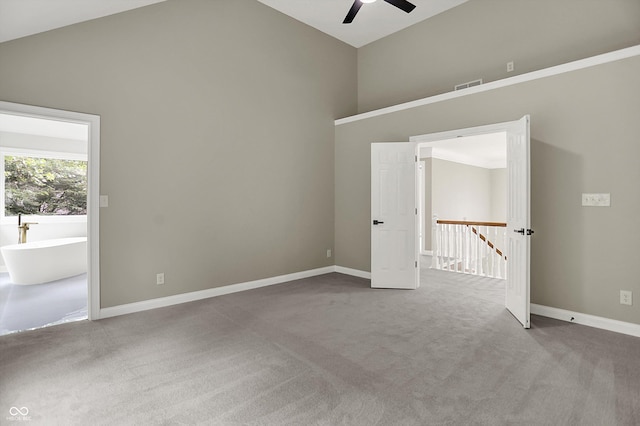 7131 Nile Ridge Ct, Indianapolis, IN 46236 - empty room with a ceiling fan, carpet, and high vaulted ceiling