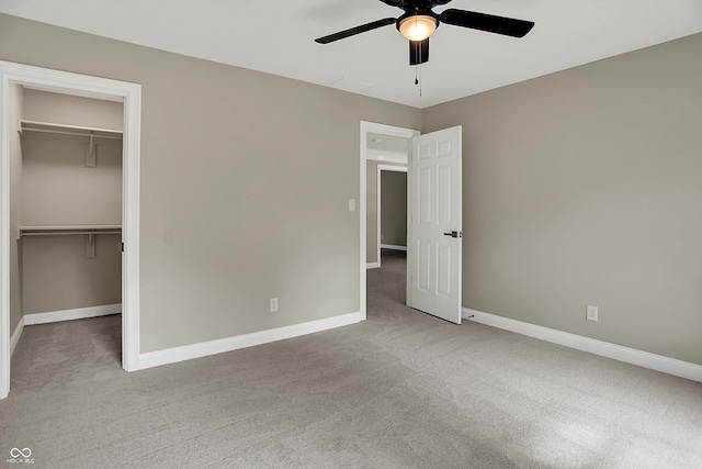 7131 Nile Ridge Ct, Indianapolis, IN 46236 - unfurnished bedroom with carpet, a spacious closet, a closet, and a ceiling fan