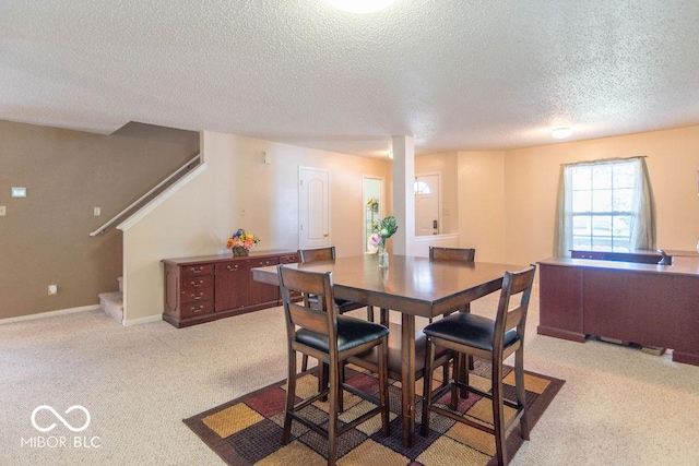 8703 Mellot Way, Camby, IN 46113 - dining space with a textured ceiling, stairway, and carpet floors