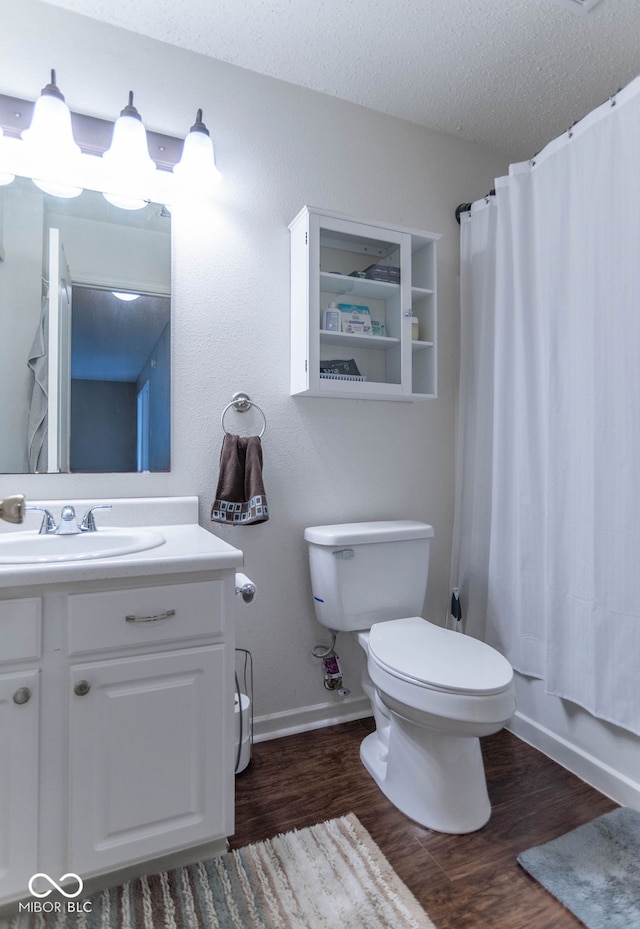 8703 Mellot Way, Camby, IN 46113 - bathroom with wood finished floors, vanity, a textured ceiling, and shower / tub combo with curtain