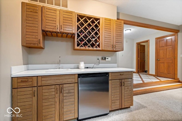 5298 Royal Troon Way, Avon, IN 46123 - kitchen with stainless steel dishwasher, light countertops, and light carpet