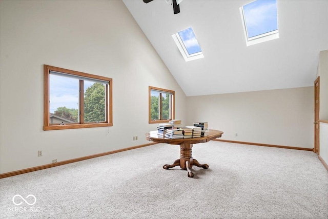 5298 Royal Troon Way, Avon, IN 46123 - interior space with carpet flooring, a skylight, high vaulted ceiling, and ceiling fan