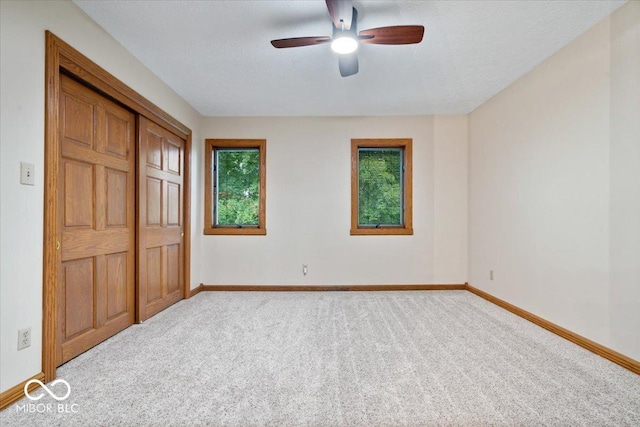 5298 Royal Troon Way, Avon, IN 46123 - unfurnished bedroom with carpet floors, ceiling fan, and a closet