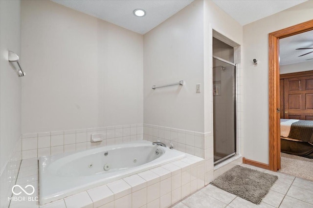 5298 Royal Troon Way, Avon, IN 46123 - bathroom with a jetted tub, a stall shower, ensuite bath, and tile patterned floors