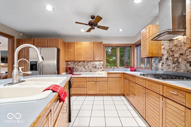 5298 Royal Troon Way, Avon, IN 46123 - kitchen with wall chimney range hood, appliances with stainless steel finishes, ceiling fan, tasteful backsplash, and recessed lighting
