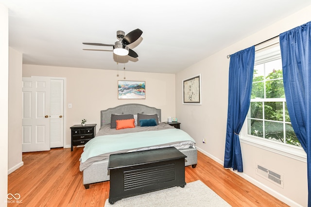 7014 Creekside Ln, Indianapolis, IN 46220 - bedroom featuring light wood-style floors and a ceiling fan