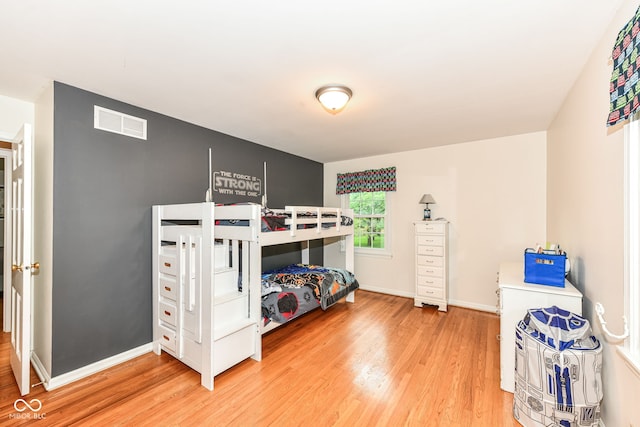 7014 Creekside Ln, Indianapolis, IN 46220 - bedroom featuring light wood-style floors and baseboards