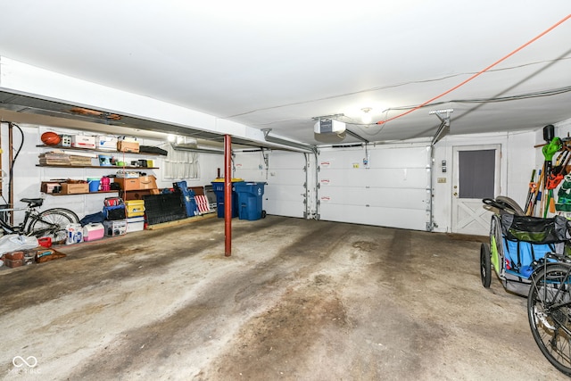 7014 Creekside Ln, Indianapolis, IN 46220 - garage featuring a garage door opener