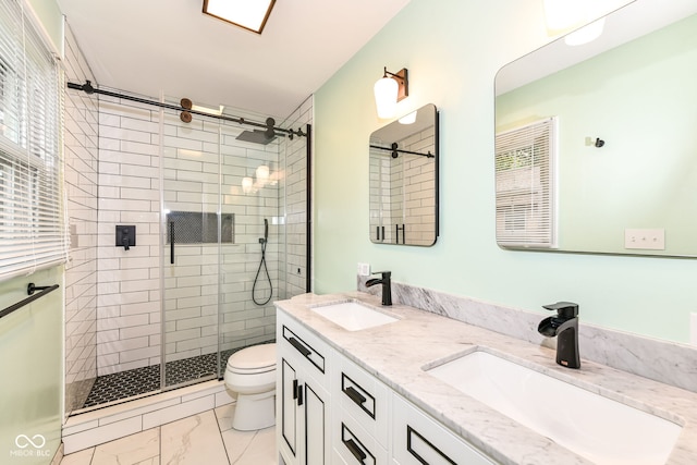 7014 Creekside Ln, Indianapolis, IN 46220 - full bath with marble look tiles, a shower stall, and double vanity