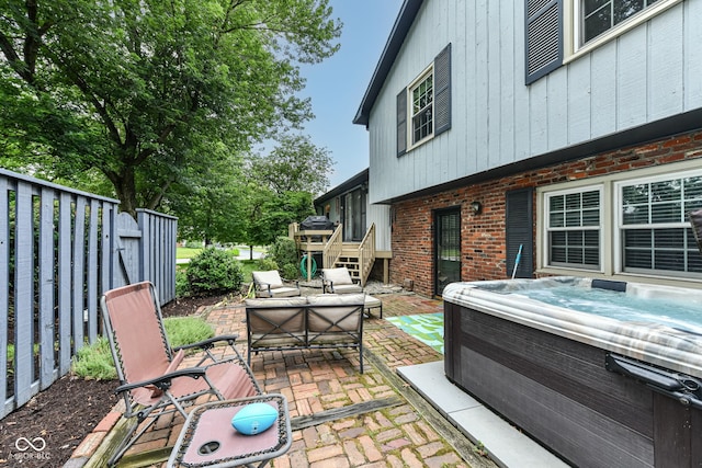 7014 Creekside Ln, Indianapolis, IN 46220 - view of patio / terrace with a hot tub, outdoor lounge area, and a wooden deck