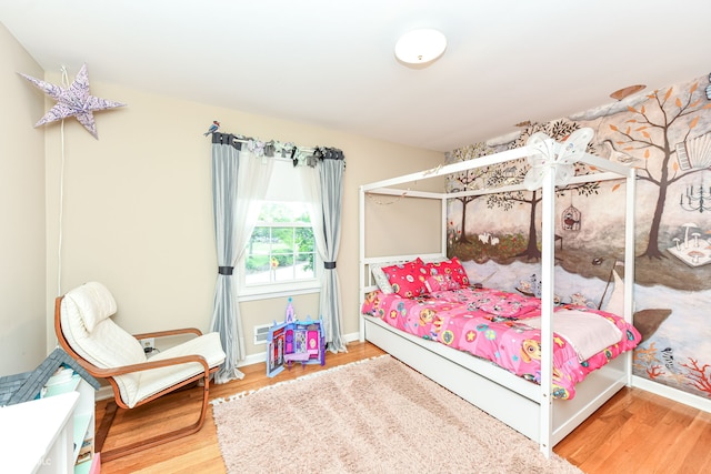 7014 Creekside Ln, Indianapolis, IN 46220 - bedroom with wood finished floors