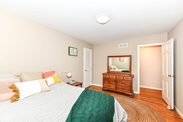 7014 Creekside Ln, Indianapolis, IN 46220 - bedroom featuring wood finished floors and baseboards