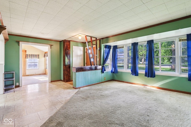 202 W Elbert St, Indianapolis, IN 46217 - carpeted spare room with ornamental molding and baseboards