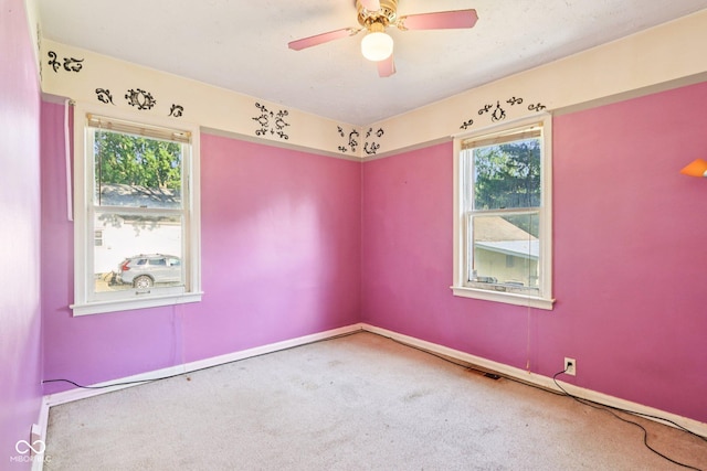 202 W Elbert St, Indianapolis, IN 46217 - carpeted empty room featuring a ceiling fan and baseboards