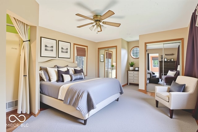 202 W Elbert St, Indianapolis, IN 46217 - bedroom featuring two closets and ceiling fan