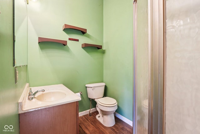 202 W Elbert St, Indianapolis, IN 46217 - bathroom featuring vanity and wood finished floors