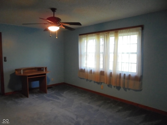 219 S Main St, Modoc, IN 47358 - carpeted spare room with a ceiling fan and baseboards