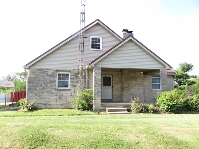219 S Main St, Modoc, IN 47358 - view of front of house with stone siding and a chimney