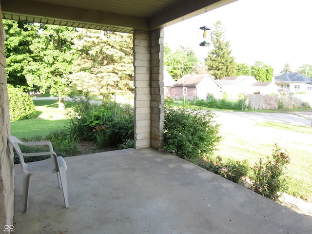219 S Main St, Modoc, IN 47358 - view of patio featuring a residential view