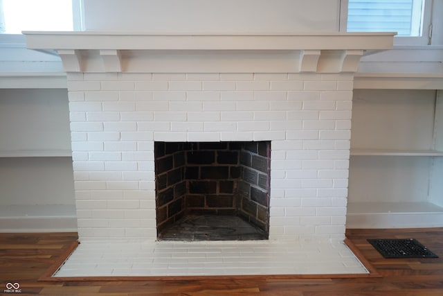 3554 N Illinois St, Indianapolis, IN 46208 - detailed view of a fireplace with flush hearth and wood finished floors