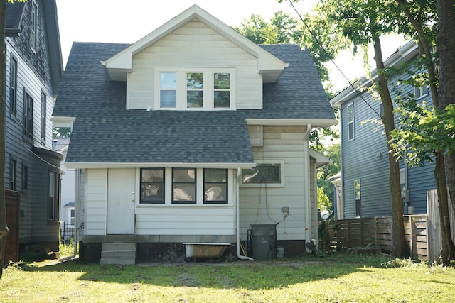 3554 N Illinois St, Indianapolis, IN 46208 - rear view of house featuring roof with shingles