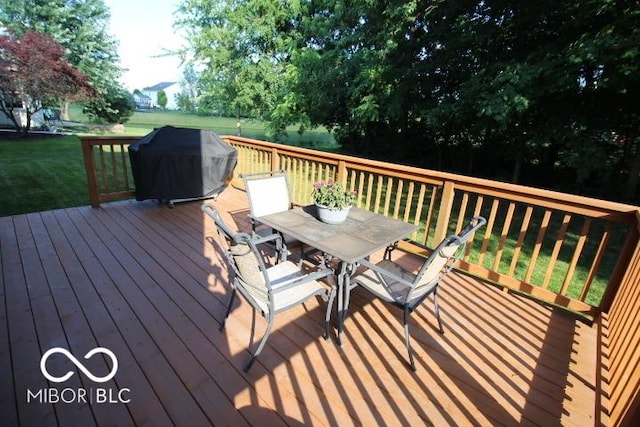 11275 Catalina Dr, Fishers, IN 46038 - wooden deck featuring outdoor dining space, area for grilling, and a yard
