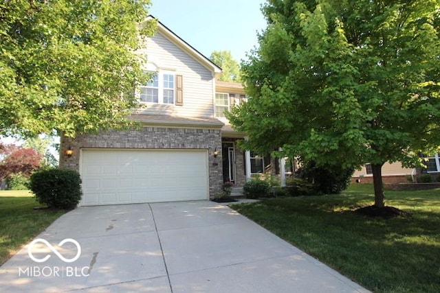11275 Catalina Dr, Fishers, IN 46038 - obstructed view of property featuring driveway, a front lawn, an attached garage, and brick siding