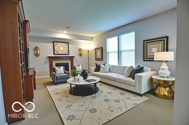 11275 Catalina Dr, Fishers, IN 46038 - carpeted living room with a fireplace and recessed lighting