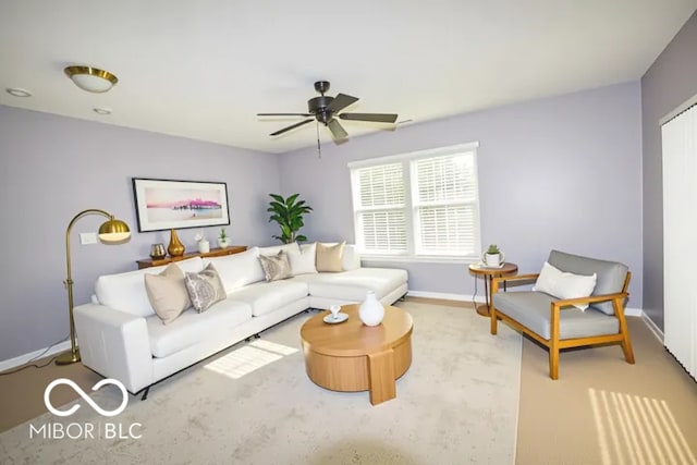 11275 Catalina Dr, Fishers, IN 46038 - living area featuring a ceiling fan and baseboards