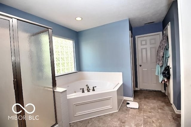 11275 Catalina Dr, Fishers, IN 46038 - full bath with a shower stall and a garden tub