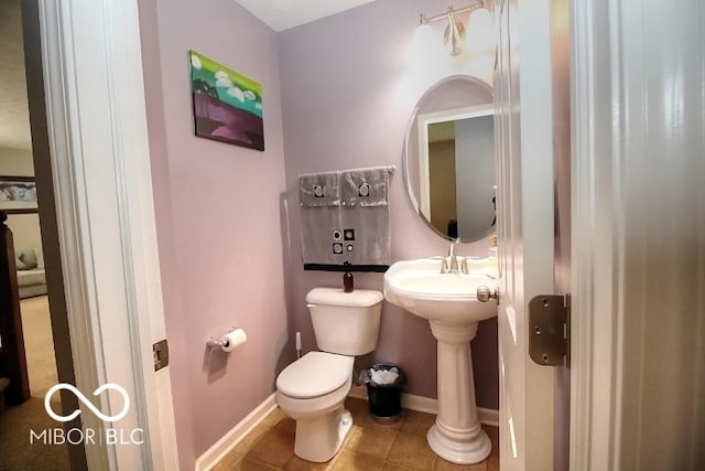 11275 Catalina Dr, Fishers, IN 46038 - half bath with toilet and tile patterned floors
