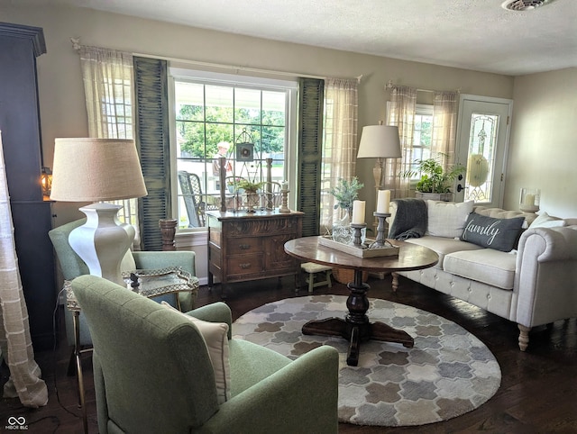 3236 Spruce St, Columbus, IN 47203 - living room featuring wood finished floors and a textured ceiling